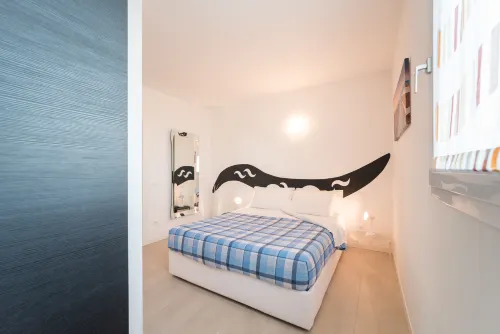 Elegante Residenza Torre Bianca Appartamento con 2 camere da letto per 5 persone