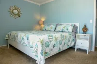 Freshly updated beachfront condo with stunning views.  Sleeps 4.  Onsite Pool.