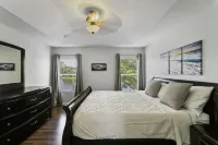 King bed, Water Views, sleeps 8, TVs in every room, public pool.