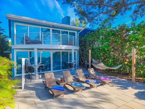 Luxurious Oceanfront Home w/ MILES of sandy beach & private Inter-Coastal dock!