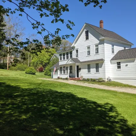 Enjoy comfortable elegance in this secluded grand home located in town