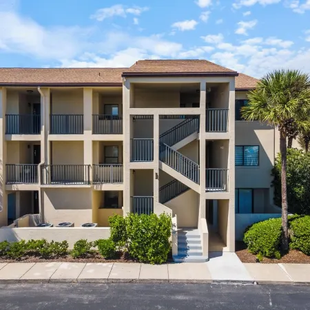 Southern C's Beachfront condo, tropical heated pool, great for family or couple