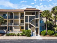 Southern C's Beachfront condo, tropical heated pool, great for family or couple