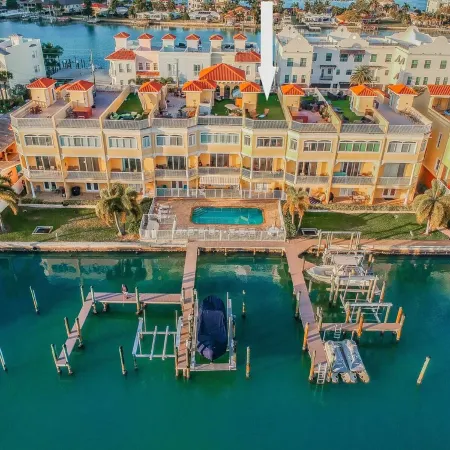 Luxury waterfront townhome, 5 min to beach, pool, fully stocked, & rooftop deck!
