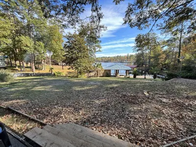 Newly remodeled lake front property with boat dock and oversized yard