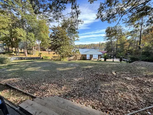 Newly remodeled lake front property with boat dock and oversized yard