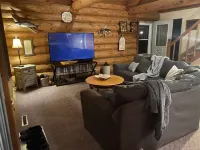 Serene Log Cabin Getaway! Close to Hiking, Snowmobile And Four Wheeler Trails.