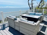 Home with spectacular panoramic ocean views from a bluff high above Cape Cod Bay