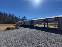 Cozy 3-bedroom 2 bath,5beds mobile home. Close to a boat launch. Covered parking