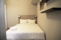 Deluxe and Comfortable the Springlake Summarecon Apartment Hotel dekat Sekolah Tinggi Teknologi Bina Tunggal