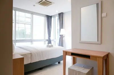 Comfortable Deluxe 2Br at the Empyreal Condominium Epicentrum Apartment by Travelio