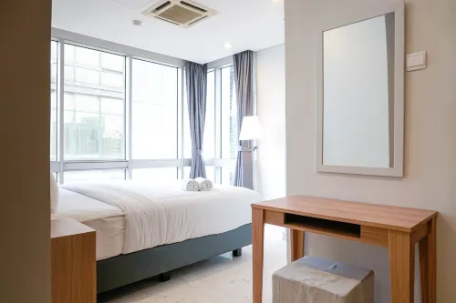 Comfortable Deluxe 2Br at the Empyreal Condominium Epicentrum Apartment by Travelio