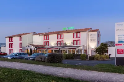 Brit Hotel Confort La Rochelle-Bistrot Les Temps Modernes Hôtels à proximité de : La Plage d'Aytre