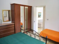 Confortevole casa vacanze italiana con giardino e barbecue