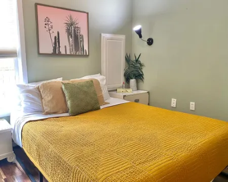 Private Parking and Sunny Front Porch - Charming Cottage Oasis