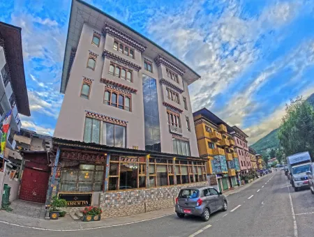 Khamsum Inn Отели в г. Тхимпху
