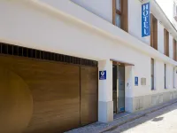 La Boutique Puerta Osario Hotels near Malmuerta Tower