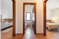 Lovely cottage with private wide garden near Orosei