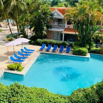 Coco Reef Resort & Spa Hotels near A.N.R. Robinson International Airport