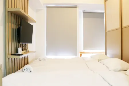 Cozy Living Studio Apartment at High Floor Tokyo Riverside Pik 2