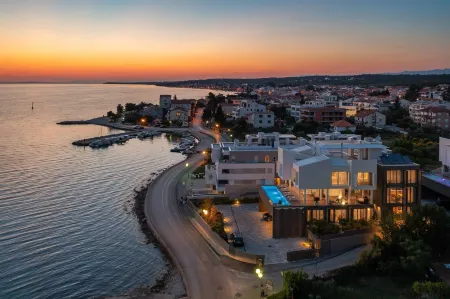 Dedaj Resort - Villa Tina Отели рядом с достопримечательностью «Plaža Petrčane»