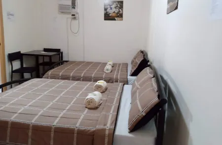 Dmc Caralos Vacation Inn and Dormitory