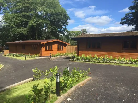 Shellow Lane Lodges Отели в г. Конгльтон