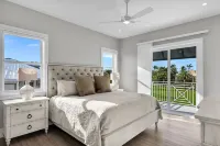 Sophisticated 5-bedroom, elevator, 50' dock, heated pool/spa, sleep 12