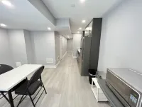 One bedroom ensuite toilet on main level & kitchen, living, bathroom lower level