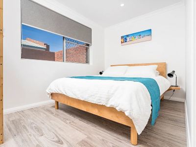 2 Bedroom Unit Central, 5 minutes walk to pristine beaches! Newly renovated