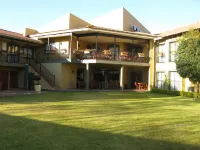 Benvenuto Hotel & Conference Centre Hotels near Zoo Lake