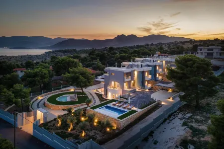 Cavos Boutique Homes Отели в г. Коринф