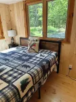 Welcoming 4-bedroom lake front cabin in charming Otis on Beech Hill Pond.