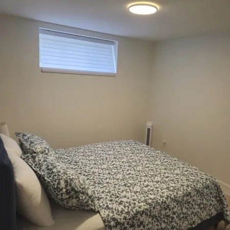 Fully furnished 1-bed basement apt in Moncton, fits 3 adults. Modern & cozy