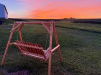 Family owned and operated spacious Farm House with a modern decorative flair.