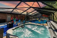 Pensacola Poolside Family Retreat w/ Hot Tub & Game Room Hotels in Myrtle Grove