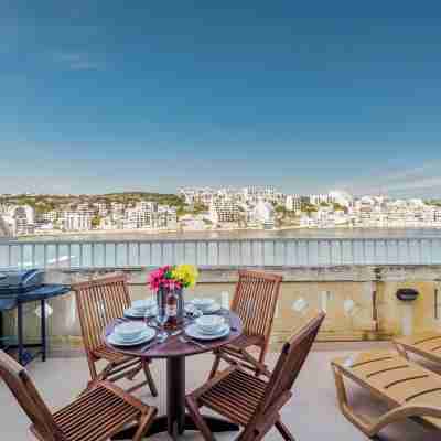 Blue Harbour 2 Bedroom Seafront Apartment with Large Terrace and BBQ in St Pauls Bay Dining/Meeting Rooms