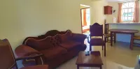 Costambar Ocean Breeze - Beachfront Apartment with Pool