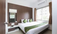 Treebo Sapphire Studio Hotels near Shri Khanderao Maharaj Mandir Ojhar