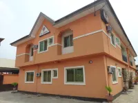 DC Bar & Suites Hotels near Oluwaga Shopping Complex