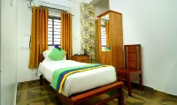 Treebo Nirupama, 750 M from Aluva Railway Station Hotels in Aluva