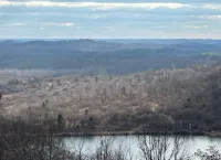 Renovated cottage w/incredible views of 54000 acres of public recreational land.