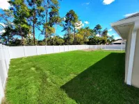 Family Oasis w/ Screened Patio & Large Master Suite, Fast Wifi Hotels near Spruce Creek Preserve Guard