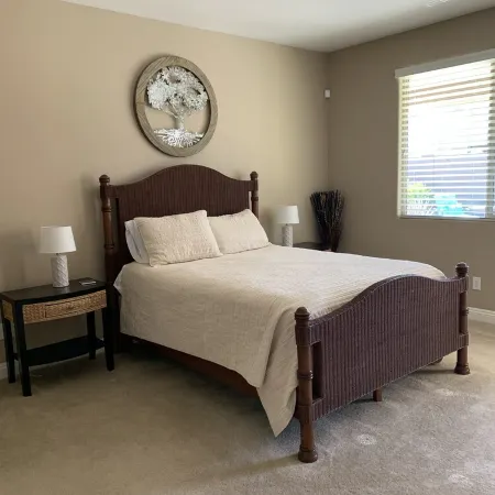 Great family friendly home very private back yard, heated pool & covered patio.