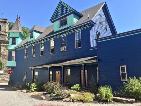 Upscale King Suite with Purple Mattress and reserved off-street parking