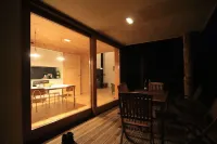 Modern wooden house on the Bodden with two apartments that can be combined
