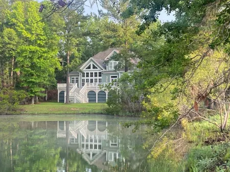 Beautiful Custom Home Overlooking Pond