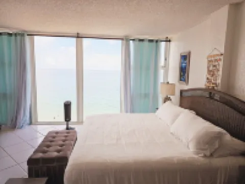 Lovely Beachfront Condo overlooking the Ocean, private jacuzzi, balcony & pool