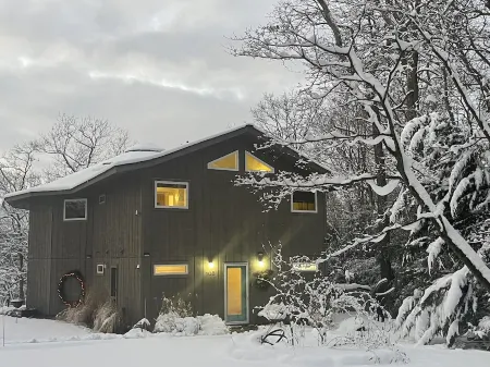 Osseo Lake Lodge  Unique Octagon Home with Sunset Views & Private Waterfront