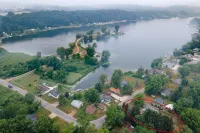 Lake front home with access to two lakes, large yard and RV hookup available!